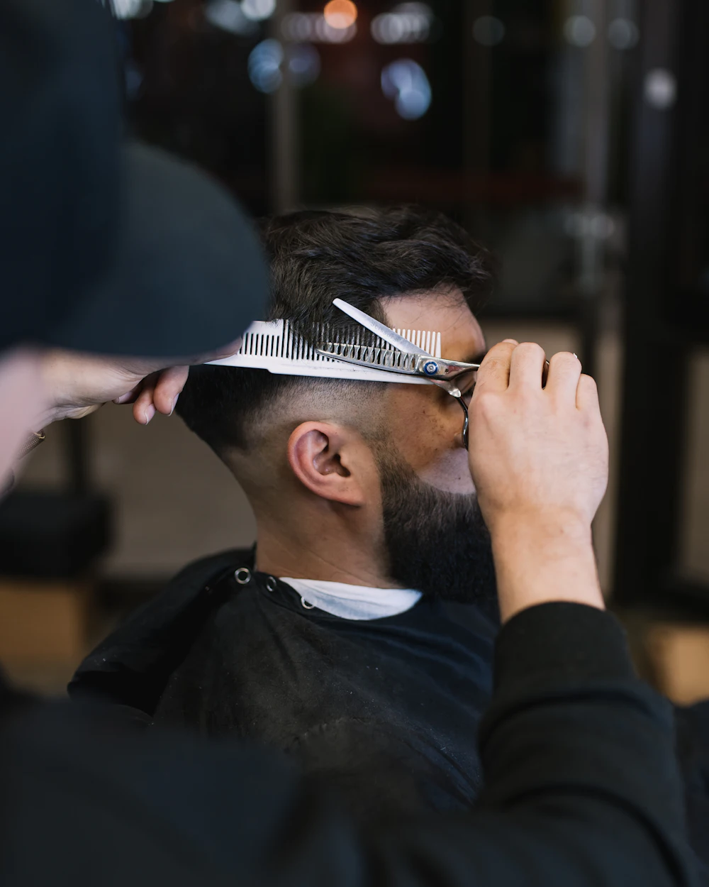 Barber cutting hair