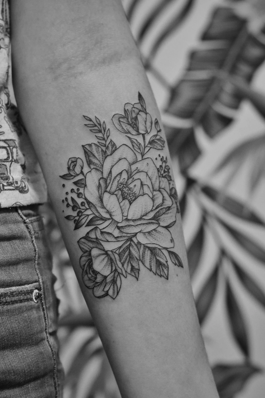 Floral arm tattoo