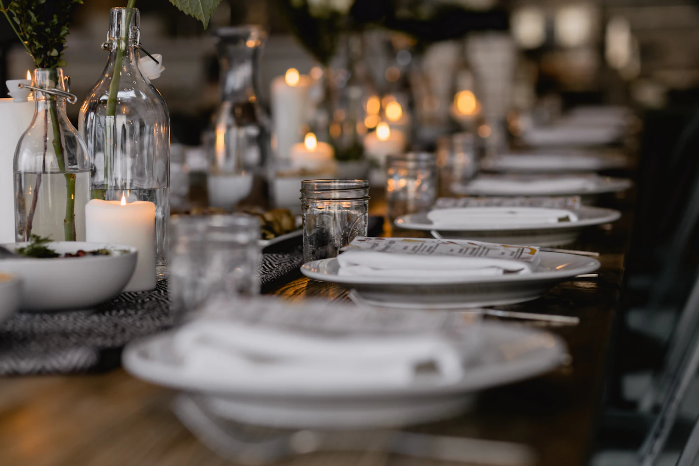 The long table set with candles