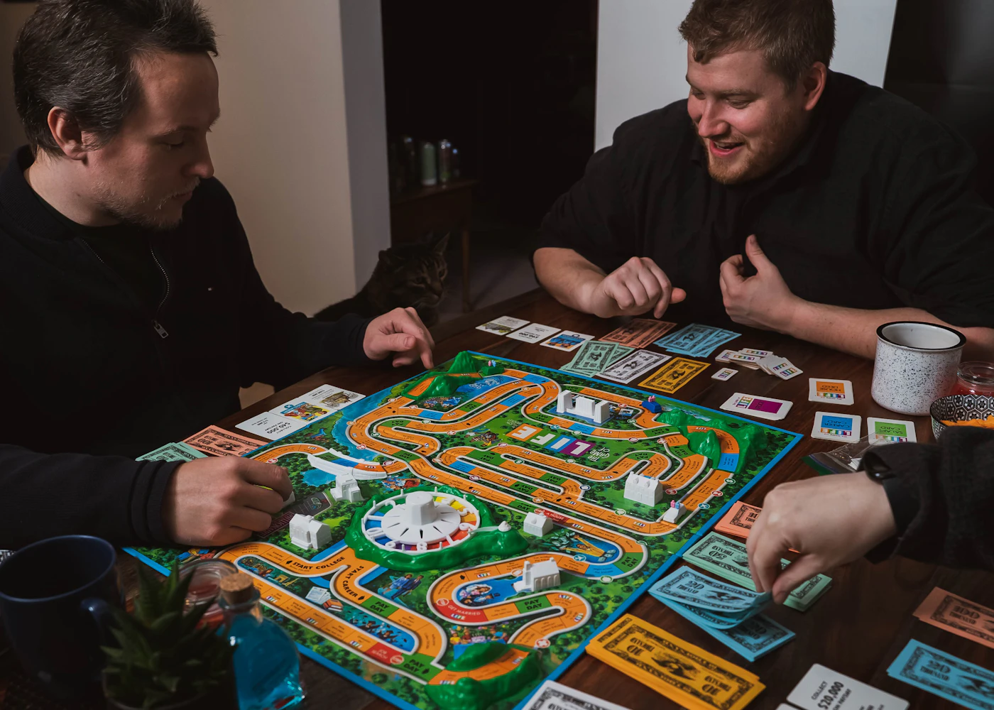 Friends playing a board game